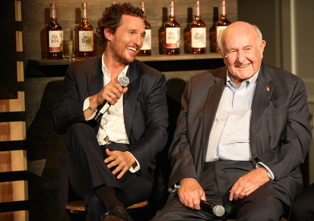 BROOKLYN, NY - SEPTEMBER 07:  Actor Matthew McConaughey (L) and Wild Turkey Master Distiller, Jimmy Russell speak to guests during the World Premiere of the Wild Turkey Campaign with Matthew McConaughey and Jimmy & Eddie Russell on September 7, 2016 in Brooklyn.  (Photo by Monica Schipper/Getty Images for Wild Turkey)
